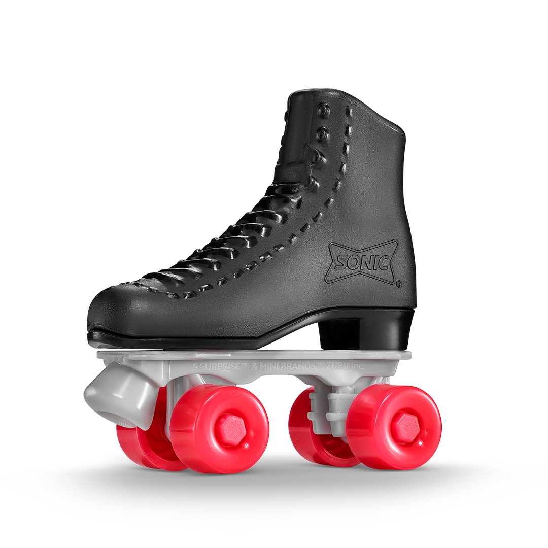 Close-up of a black Sonic Drive-In Mini Brands roller skate toy with red wheels and white axles, designed to resemble a retro roller skate with the Sonic logo embossed on the side.