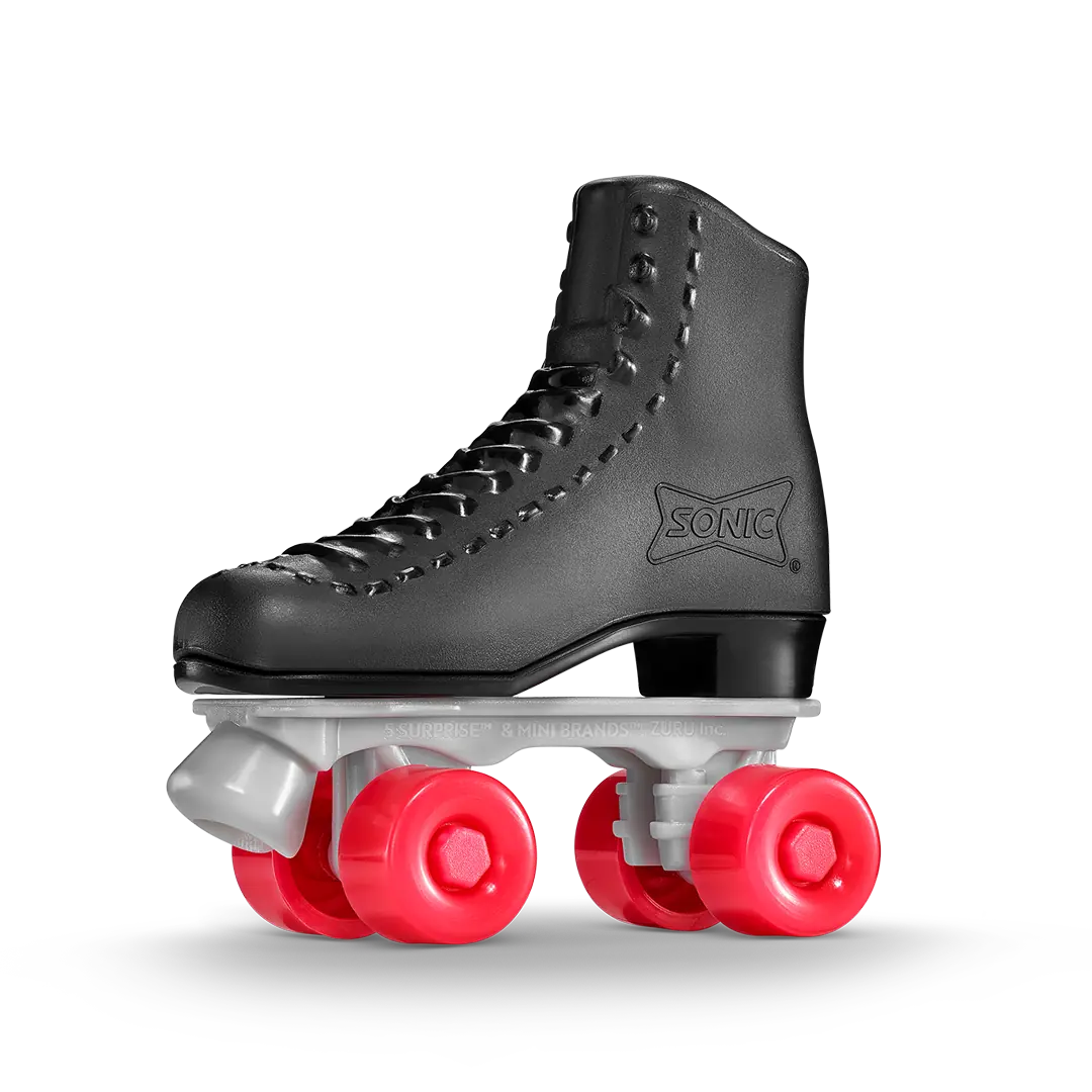 Close-up of a black Sonic Drive-In Mini Brands roller skate toy with red wheels and white axles, designed to resemble a retro roller skate with the Sonic logo embossed on the side.