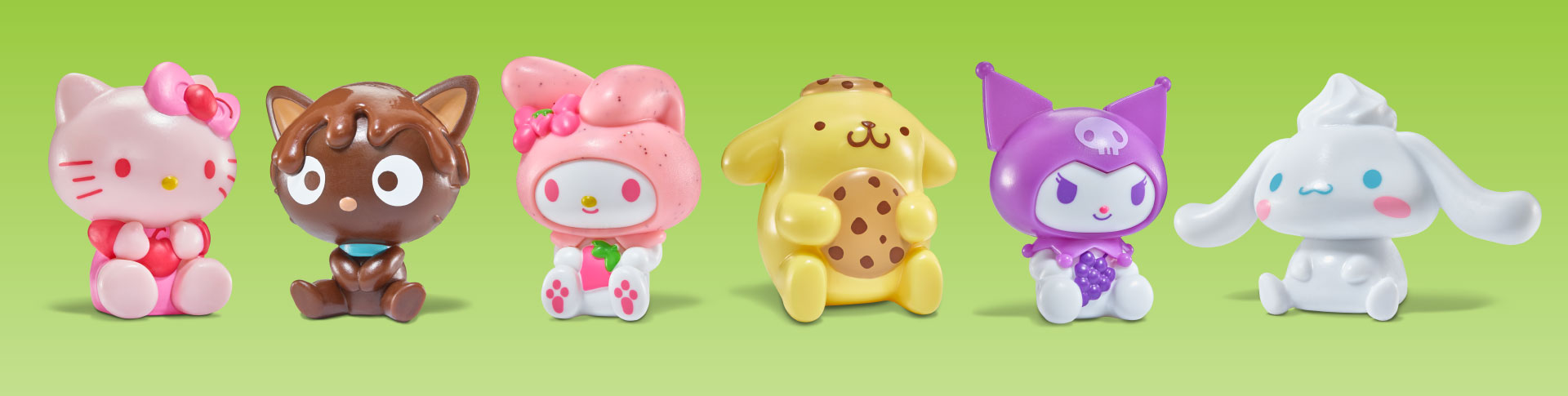 Six glossy Sanrio figurines—Hello Kitty, Chococat, My Melody, Pompompurin, Kuromi, and Cinnamoroll—displayed in a row against a light green background. Several hold flavor-themed items like a heart, strawberry, cookie, and grapes.